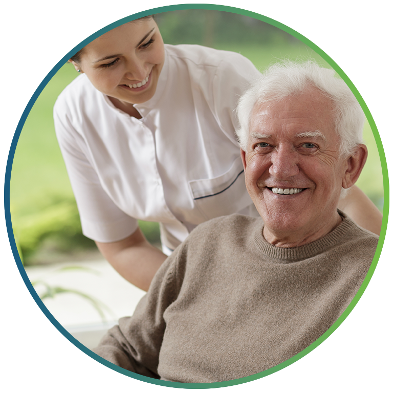 home_circle_1 senior man in wheelchair with nurse smiling